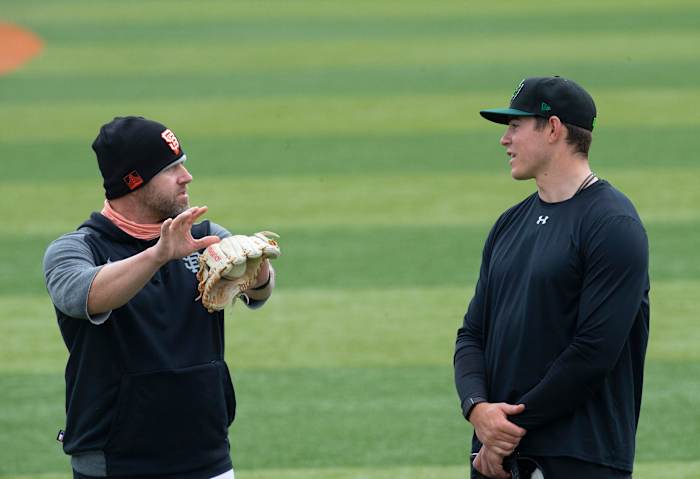 Dennis Pelfrey talks with SF Giants prospect Seth Corry in 2021.